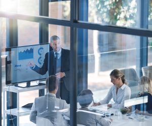 CFO in a boardroom meeting