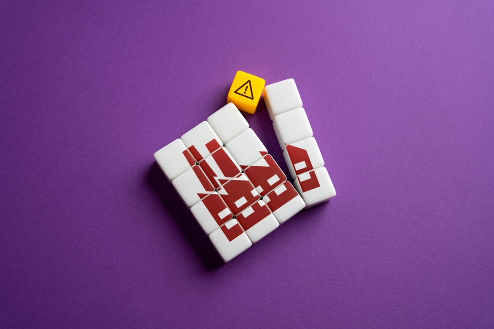 Facility emergency concept with tiles on a purple background