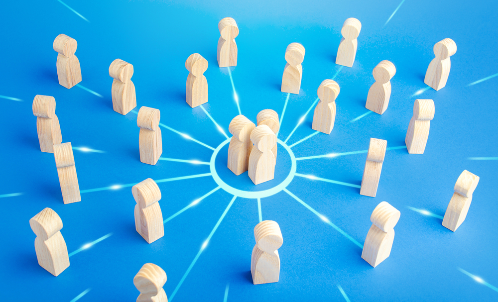 Vendor consolidation concept with figures on a blue background 